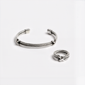 Aracne — Set Pulsera y Anillo Trenzado en Plata 925