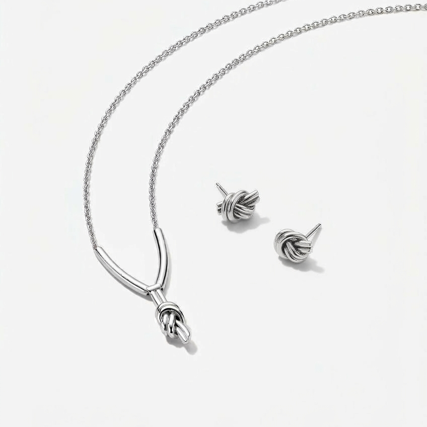 Eros — Aretes Love Knot en Plata 925 — referencia foto P33